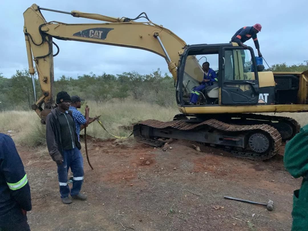 Technician repairing hydraulic cylinder